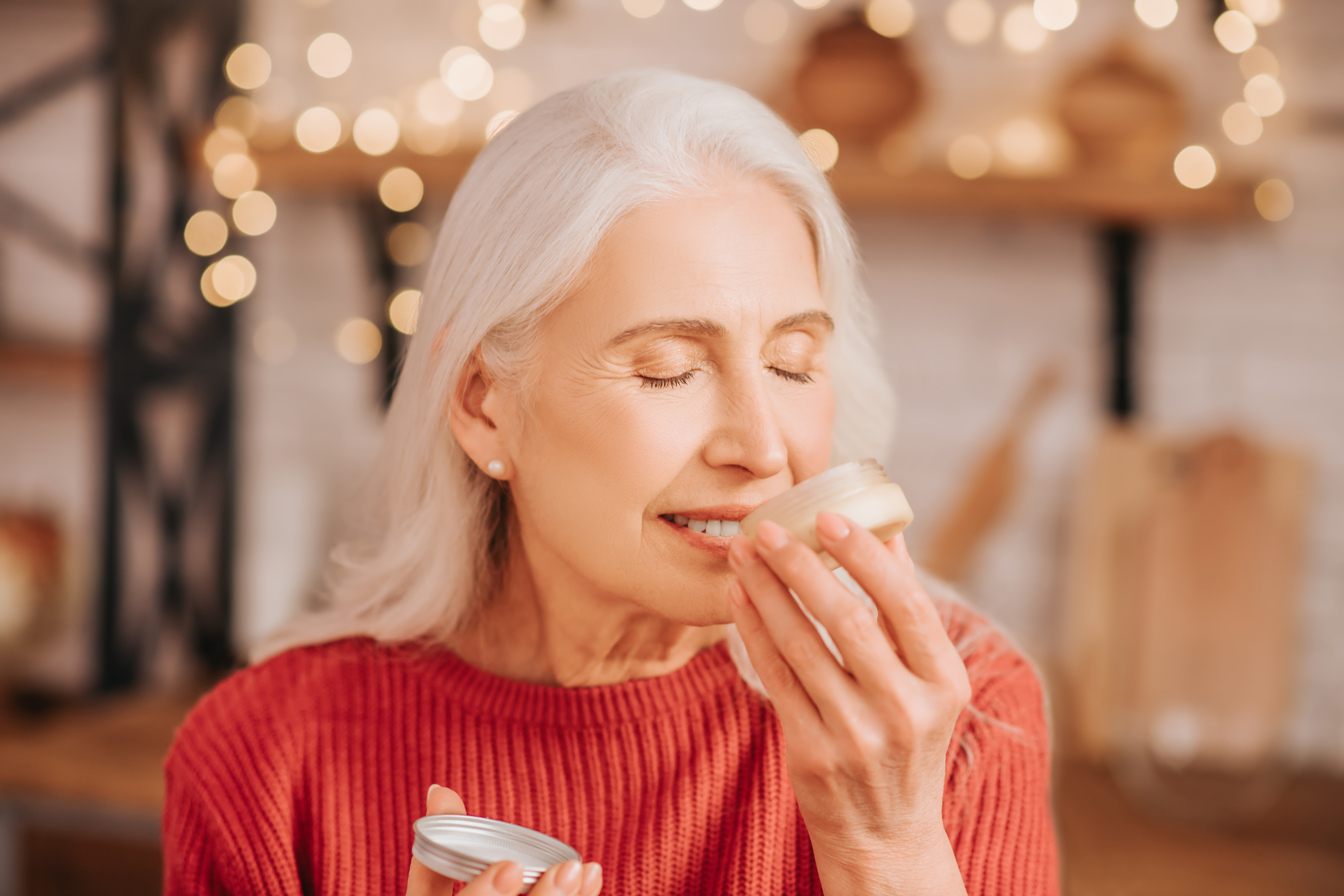 Shutterstock 1622055109 Woman Sniffing Jar